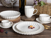 Elegante juego de vajilla de porcelana blanca con vieiras