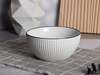 Juego de vajilla de porcelana con borde negro