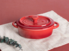 Recién llegados utensilios de cocina rojos de cerámica